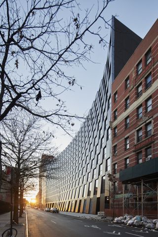 the curved façade of The Smile, a Bjarke Ingels New York building