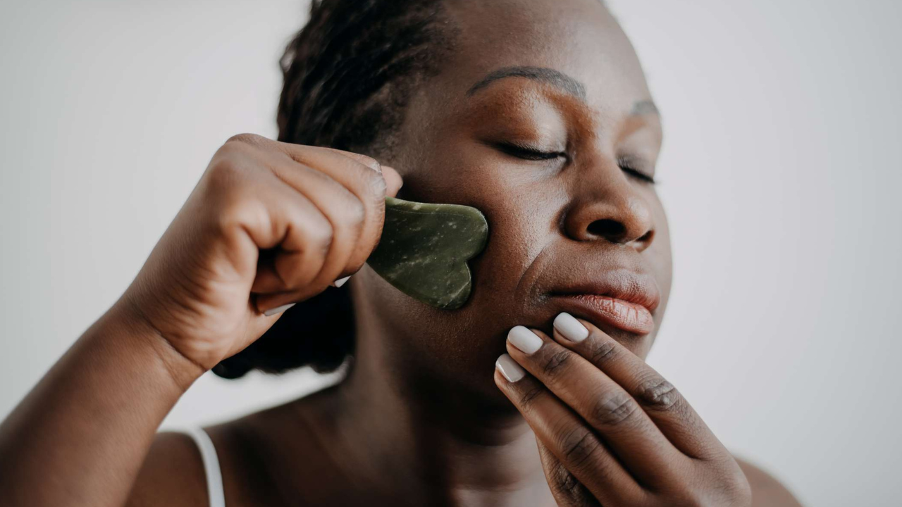 women using gua sha