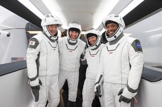 The four astronauts of NASA and SpaceX's Crew-1 mission to the International Space Station pose for a portrait during a launch rehearsal at Pad 39A of NASA's Kennedy Space Center in Cape Canaveral, Florida on Nov. 12, 2020. They are (from left): Japanese Aerospace Exploration Agency astronaut Soichi Noguchi and NASA astronauts Mike Hopkins, Shannon Walker and Victor Glover.