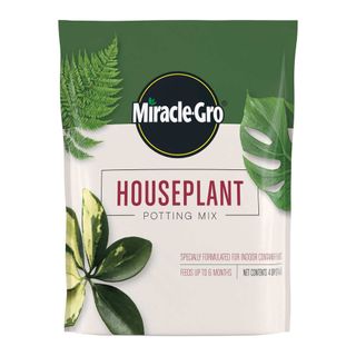 bag of Miracle-Gro® houseplant potting mix on white background