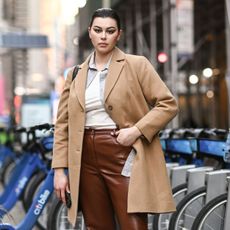 new york, new york february 25 model lauren chan is seen wearing a tan coat, white shirt, brown pants outside the christian siriano show during new york fashion week fw21 on february 25, 2021 in new york city photo by daniel zuchnikgetty images
