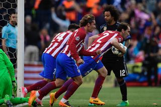 Atletico Madrid players celebrate their first goal in the Champions League semi-final second leg against Real Madrid in May 2017.