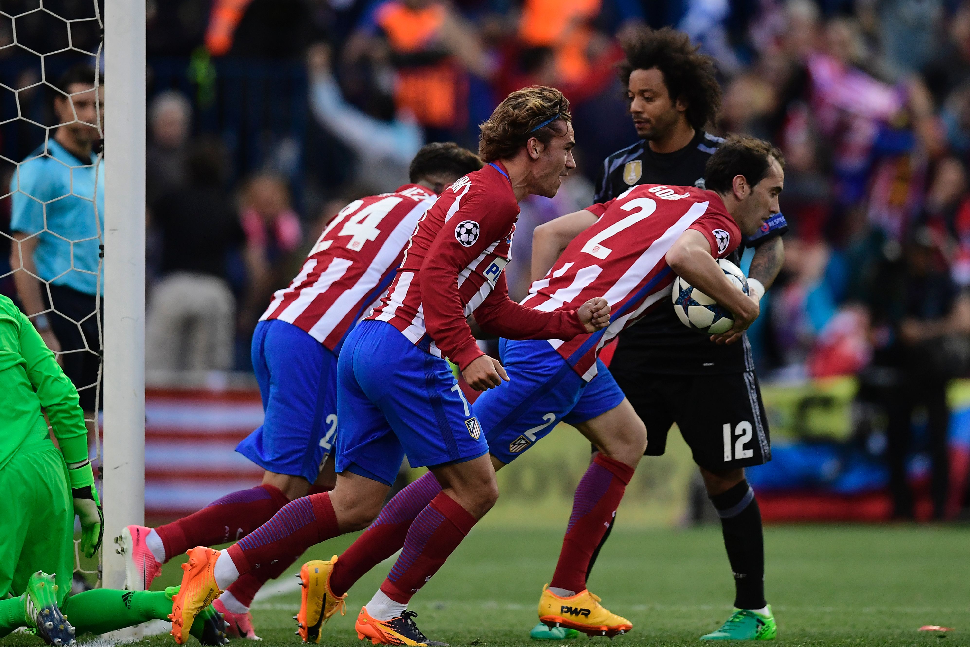 Atletico Madrid players celebrate their first goal in the Champions League semi-final second leg against Real Madrid in May 2017.