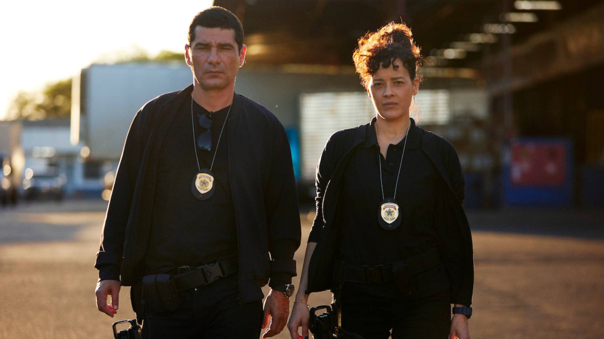 (L-R) Rômulo Braga as Benício and Maeve Jinkings as Suellen in &quot;Criminal Code&quot; season 1 on Netflix