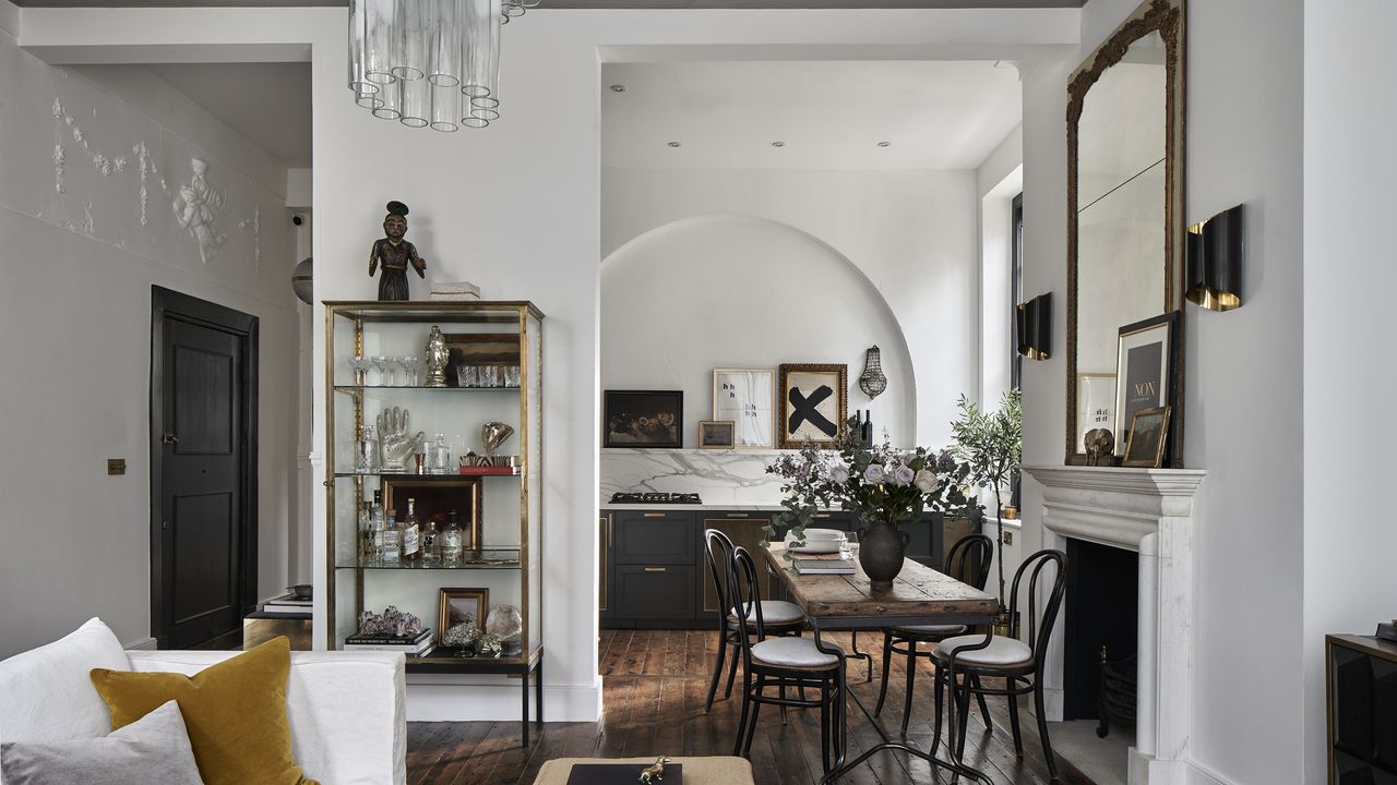 Apartment kitchen ideas - an eclectic monochrome living room filled with vintage items