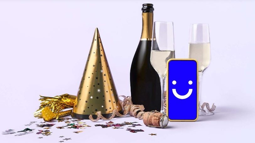 Şampanya ve Yeni Yıl öğeleri içeren görünür reklam