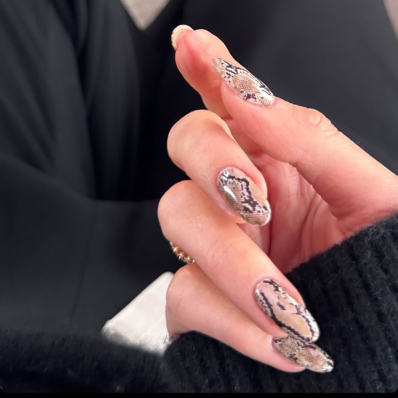 A snakeskin nude manicure by Zola Ganzorigt