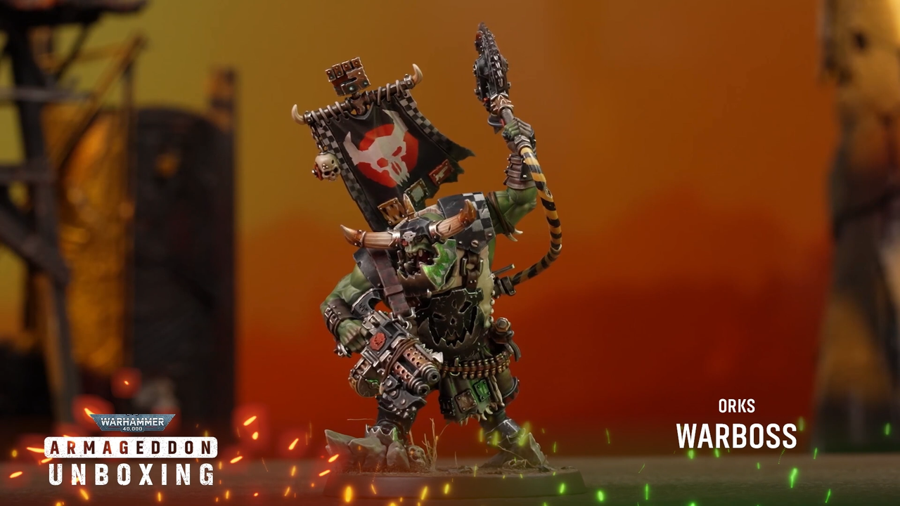 An array of Ork models against a fiery background