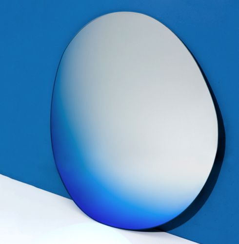The shapes of the mirrors are handdrawn, with a hue of colour added to the glass