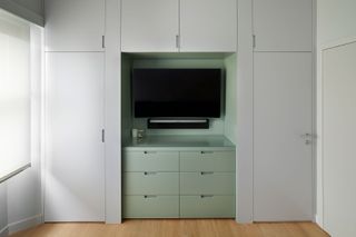 built-in storage ideas in a spare room of an apartment