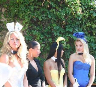 A few of the Playboy Bunnies try to figure out how in the world some of these gamer geeks got into the Playboy Mansion.
