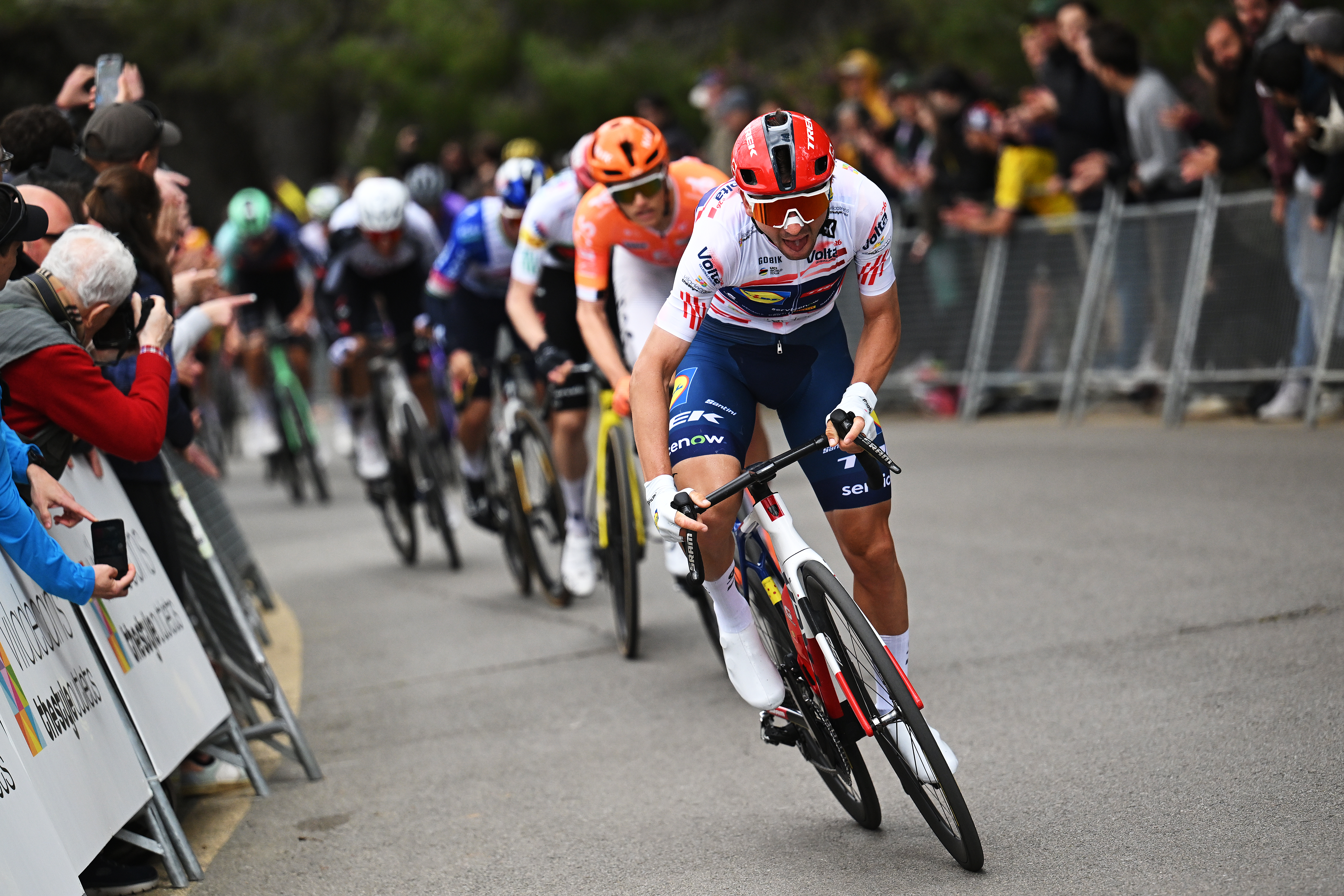 BARCELONA, SPAIN - MARCH 29: Giulio Ciccone of Italy and Team Lidl - Trek - Red Mountain Jersey attacks during the 105th Volta a Catalunya 2026, Stage 7 a 95.1km stage from Barcelona to Barcelona / #UCIWT / on March 29, 2026 in Barcelona, Spain. (Photo by Szymon Gruchalski/Getty Images)