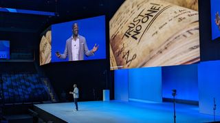 Oz Alashe speakign on stage at Dell Technologies World 2023