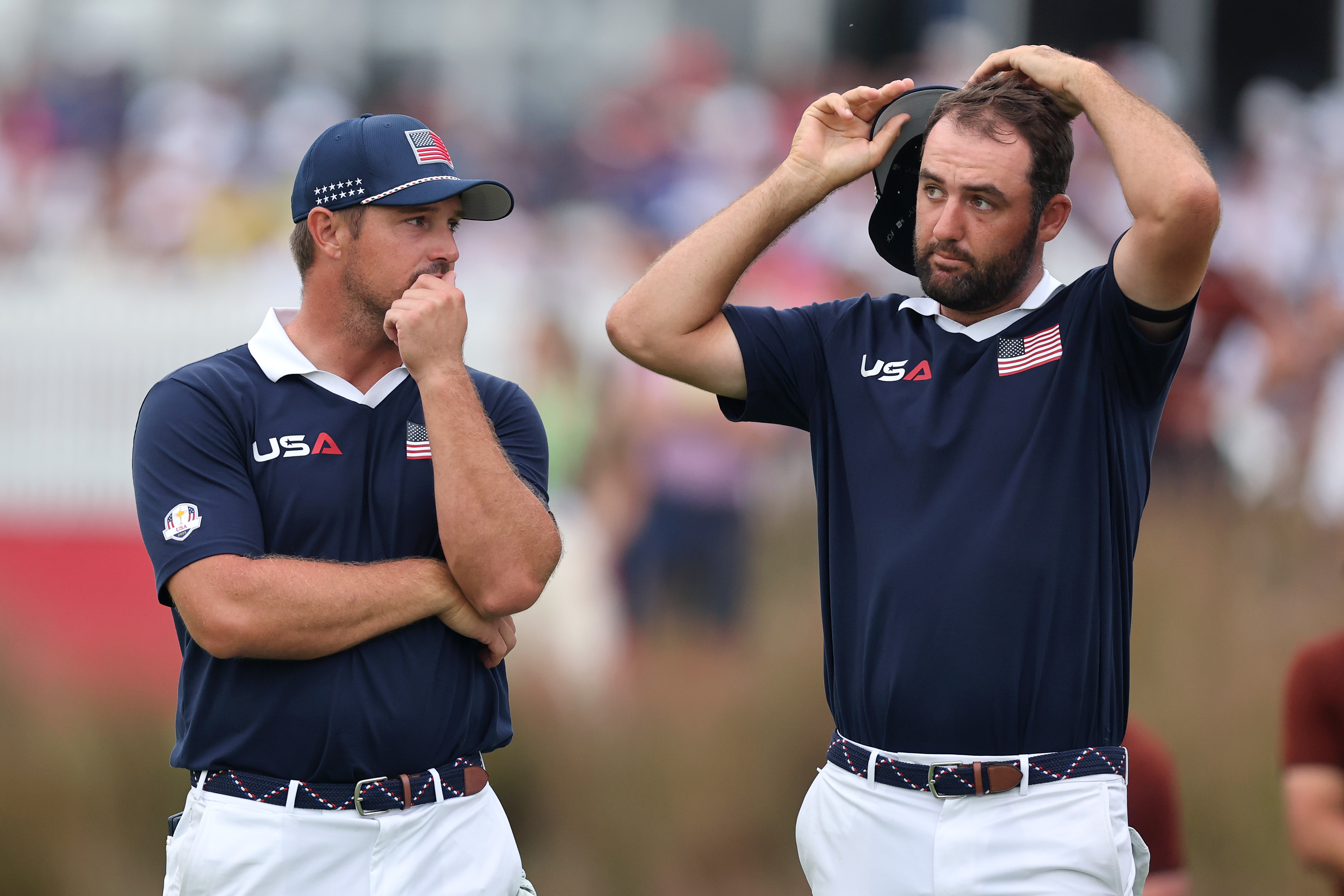 Bryson DeChambeau and Scottie Scheffler look on at the Ryder Cup