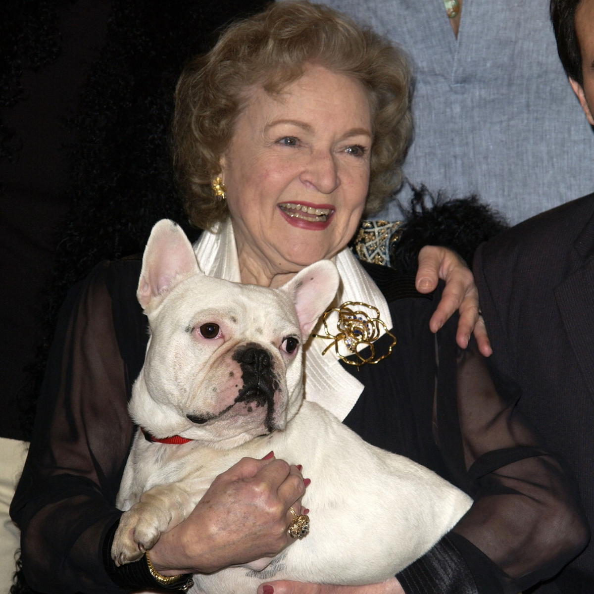 Betty White with Linus the dog during "Bringing Down the House" premiere