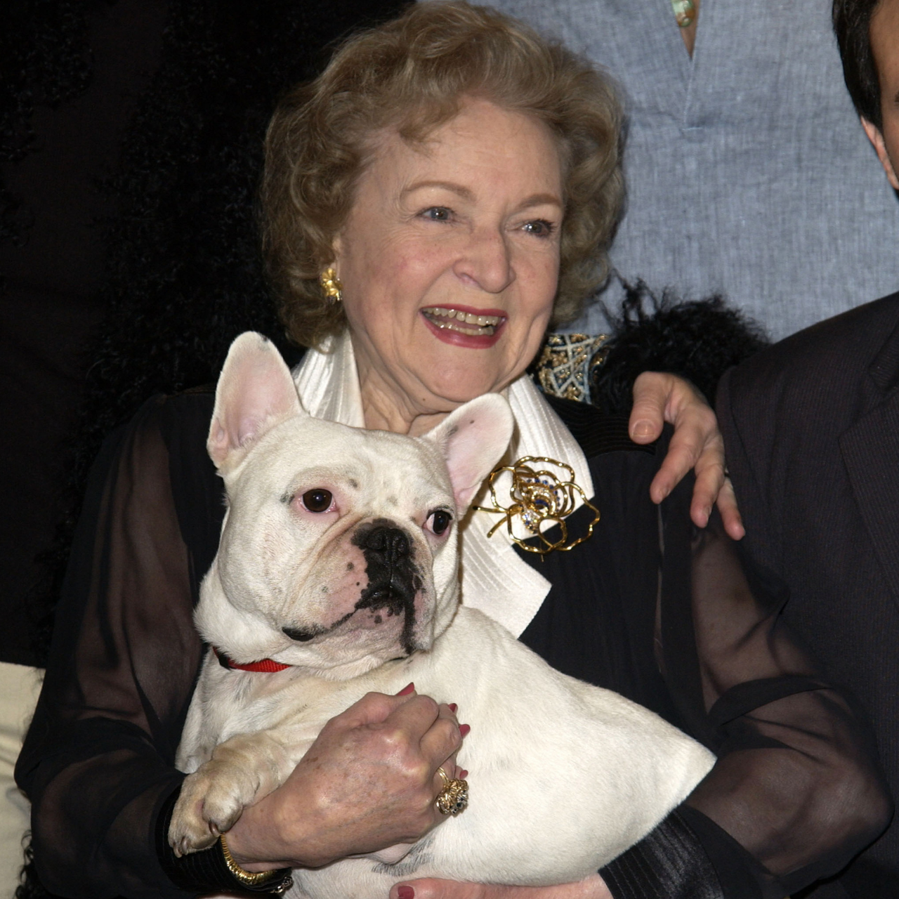 Betty White with Linus the dog during "Bringing Down the House" premiere