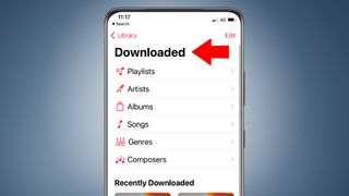 An iPhone on a blue background showing the Apple Music Classical app