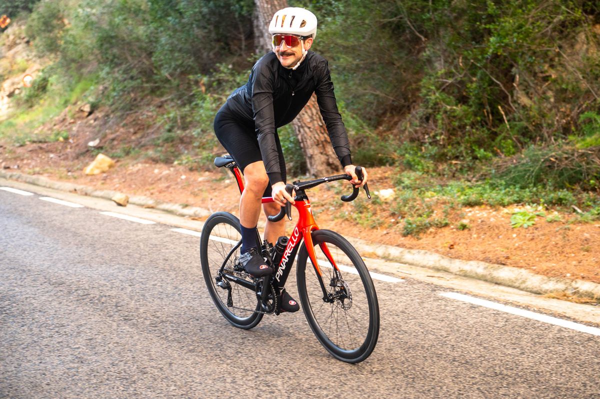 A red and black pinarello F road bike