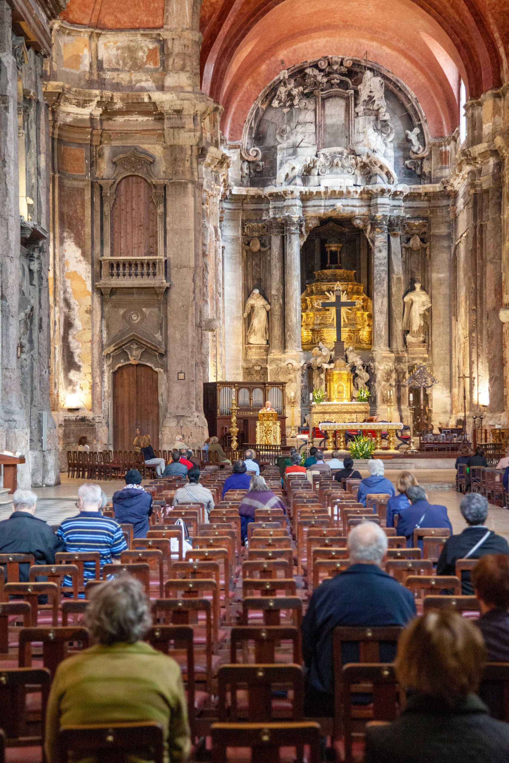 Sparse congregation inside Church of St. Dominic