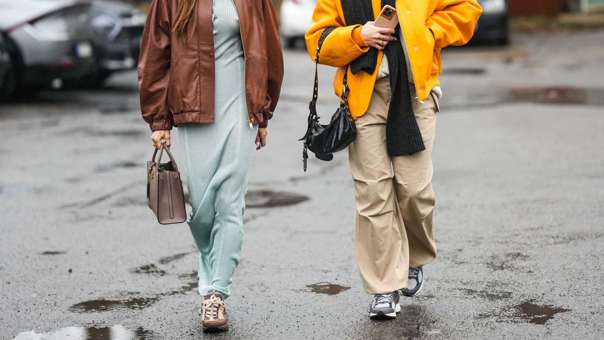 street style shot of two women wearing trainers