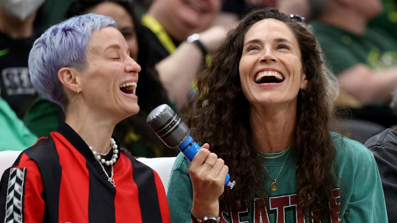 sue bird and megan rapinoe at sports game