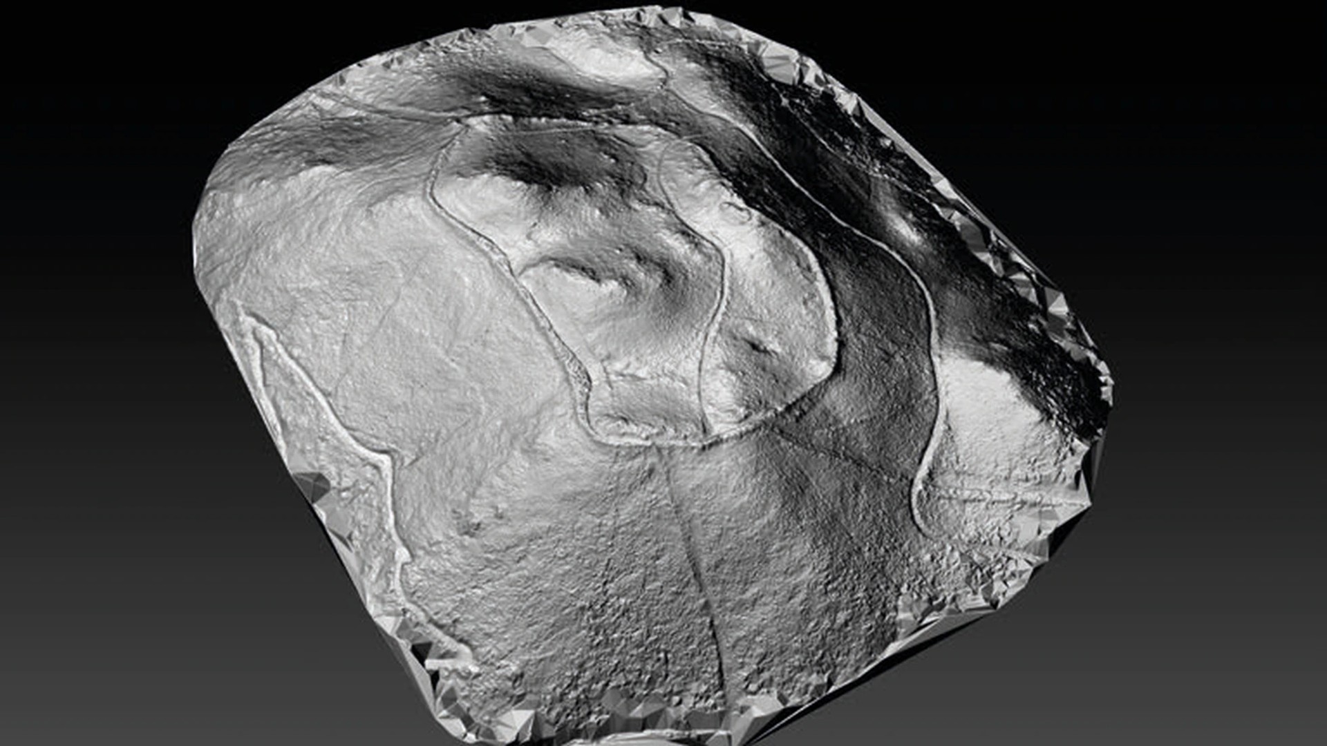 Here we see a grey topographical hill with the remains of a fort from a lidar scan against a black background.