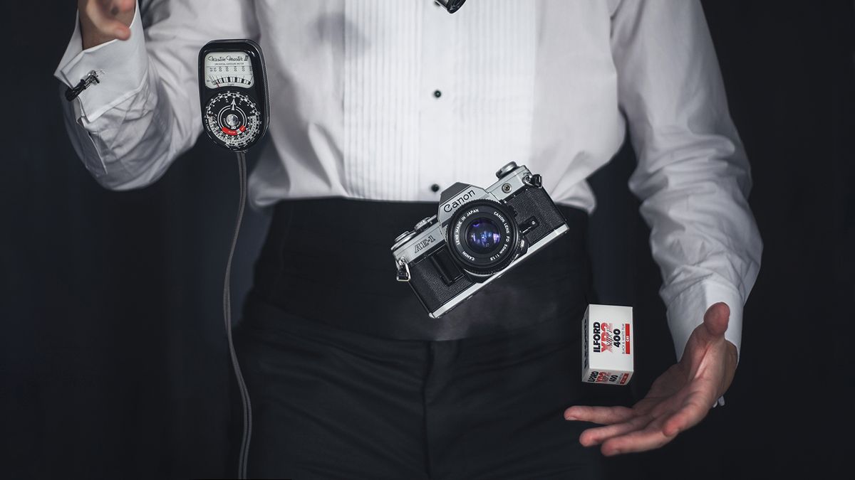 A magician making a Canon AE-1 camera &quot;float&quot;, via the magic of levitation photography!