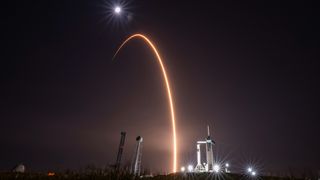 A SpaceX Falcon 9 rocket launches 21 Starlink satellites from Florida’s Cape Canaveral Space Force Station on March 12, 2025. Also visible in this photo are the Falcon 9 and Crew Dragon spacecraft that will fly the Crew-10 astronaut mission to the International Space Station for NASA. The duo are scheduled to lift off from Kennedy Space Center on March 14.