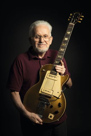 Les' song Gene Paul holding the 'Number One' Les Paul