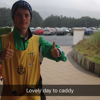 Conor Keenan caddying