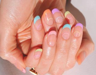 a pastel French tip manicure