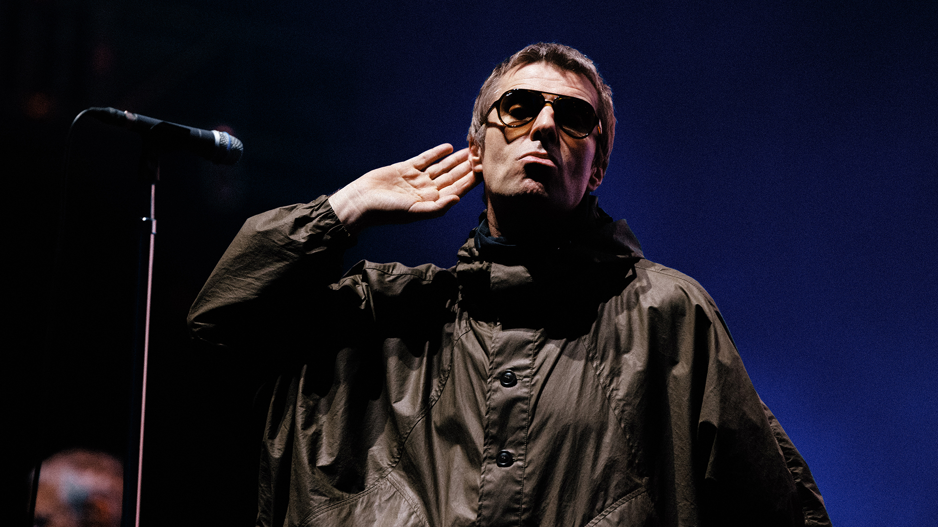 Liam Gallagher on stage during Oasis' 2025 tour