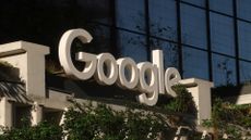 Google logo pictured above the entrance to the company's St John's Terminal office in New York City, USA.