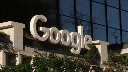 Google logo pictured above the entrance to the company's St John's Terminal office in New York City, USA.