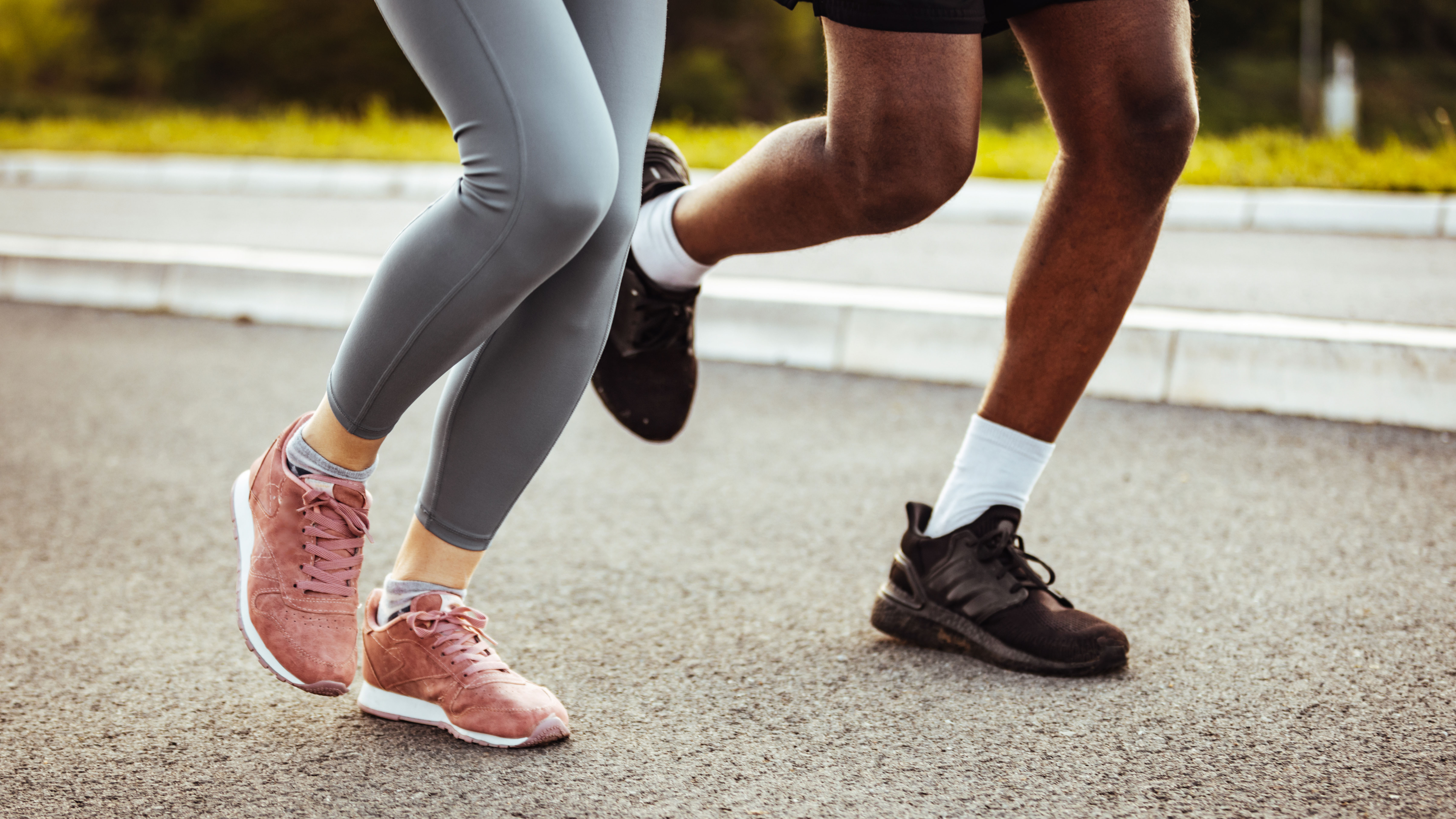Two people in running shoes