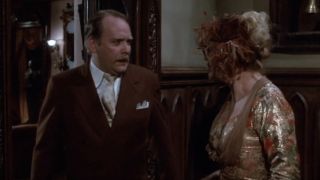 Col. Mustard talking to Mrs. Peacock in Clue