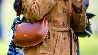 duchess sophie wearing isabel marant moon bag in brown