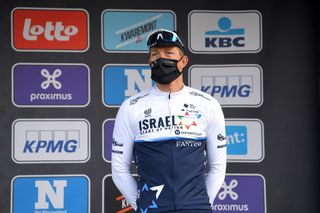 NINOVE BELGIUM FEBRUARY 27 Podium Sep Vanmarcke of Belgium and Team Israel StartUp Nation Celebration during the 76th Omloop Het Nieuwsblad 2021 Mens Race a 2005km race from Ghent to Ninove OmloopHNB OHN21 FlandersClassic on February 27 2021 in Ninove Belgium Photo by Luc ClaessenGetty Images