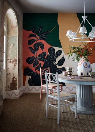 Dining room with mural by Fromental wallcoverings