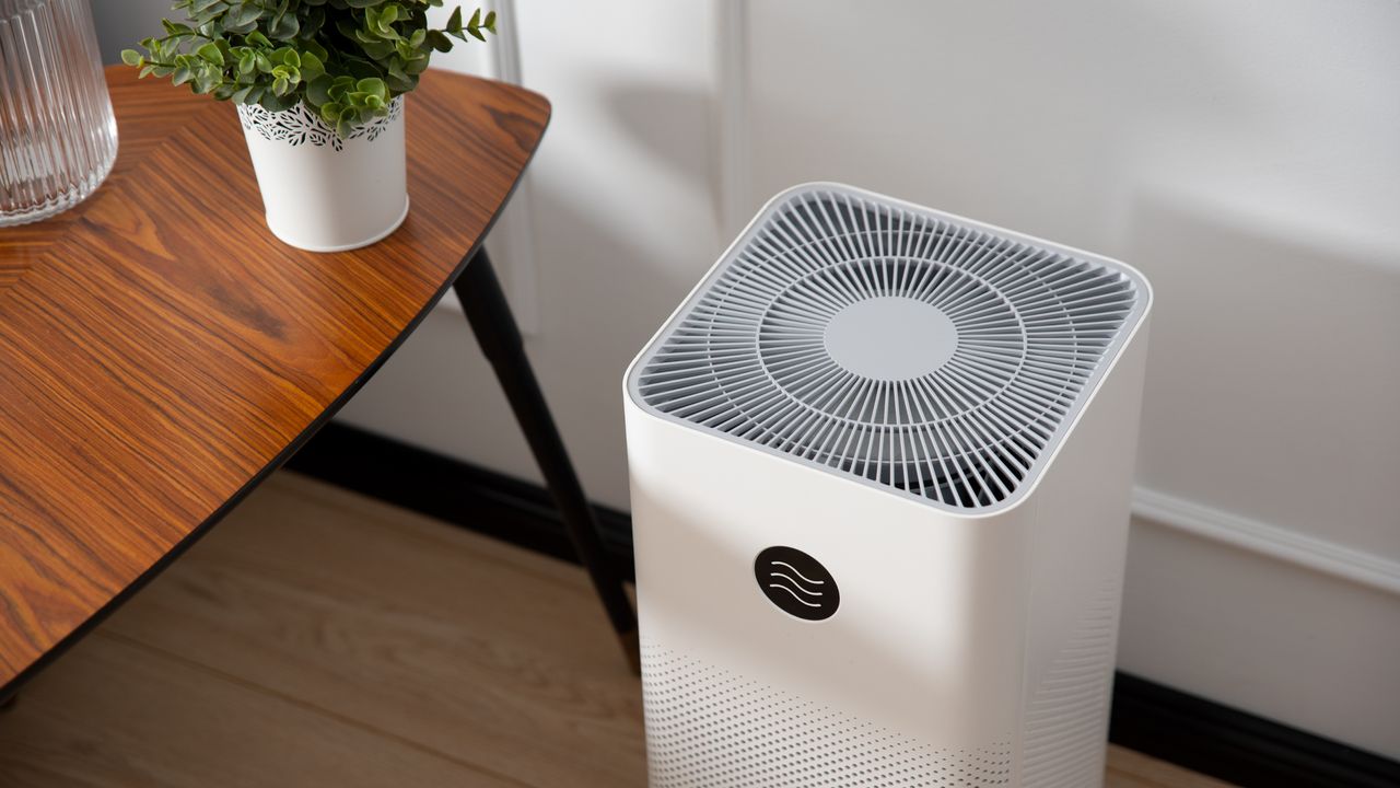 White large capacity air purifier displayed in room 