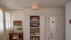 Gem Tuberose light cover by Tulip Shades styled in an NYC bathroom