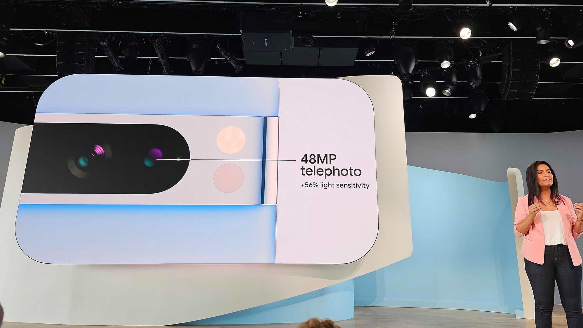 Google Pixel 8 launch on stage telephoto camera slide