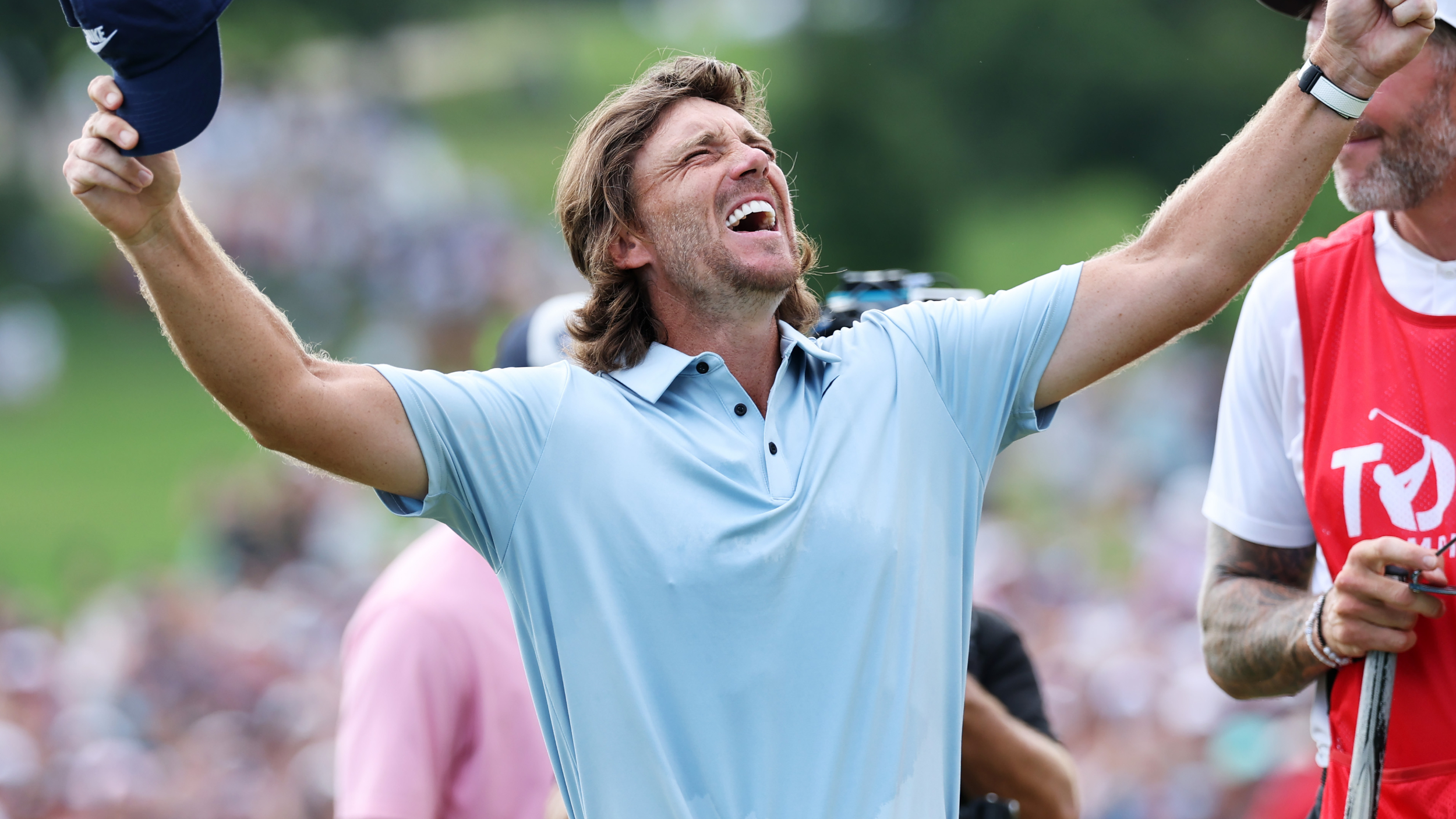 Tommy Fleetwood celebrates winning the Tour Championship