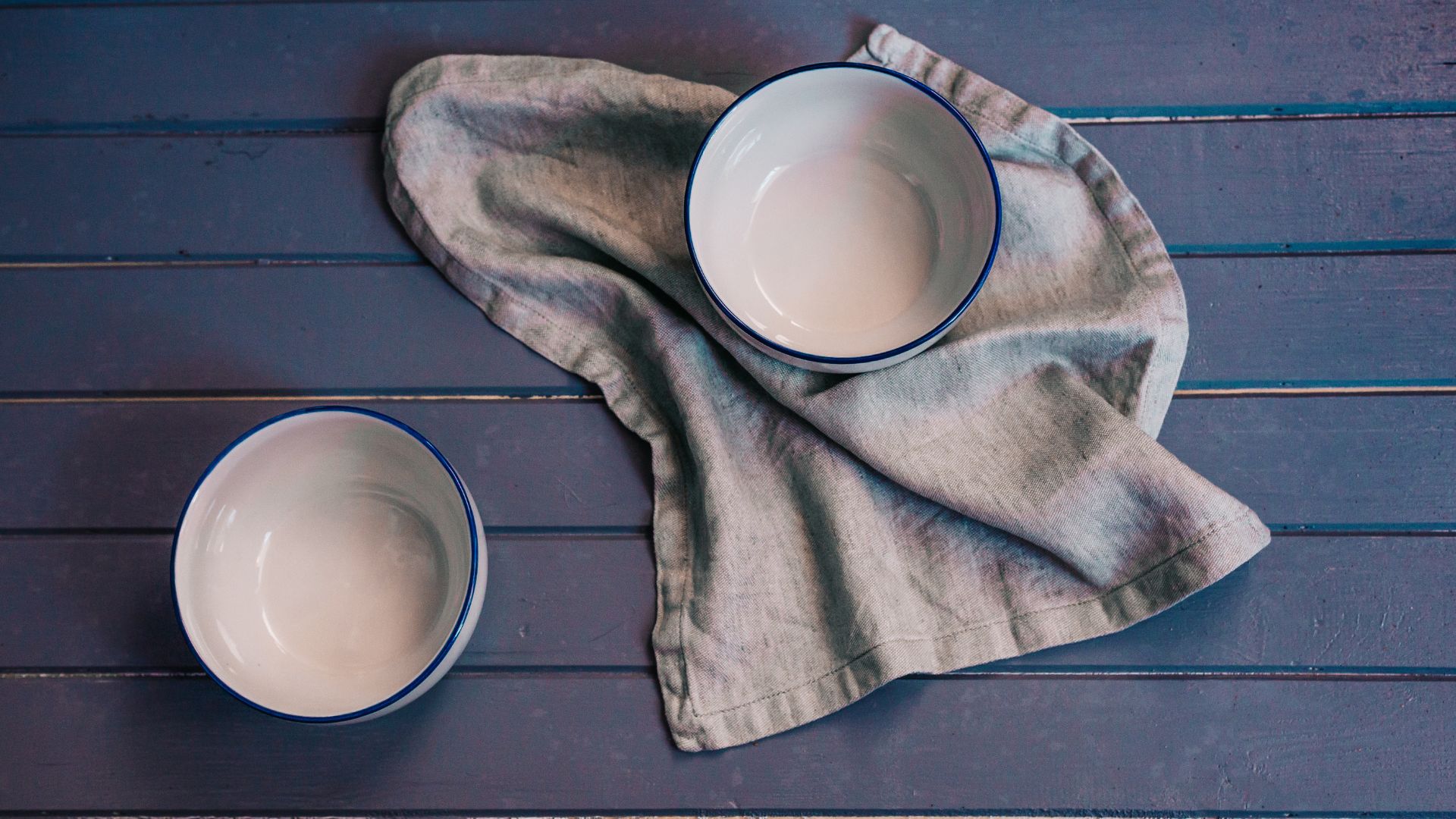 Mixing bowls, placed on top of a damp towel