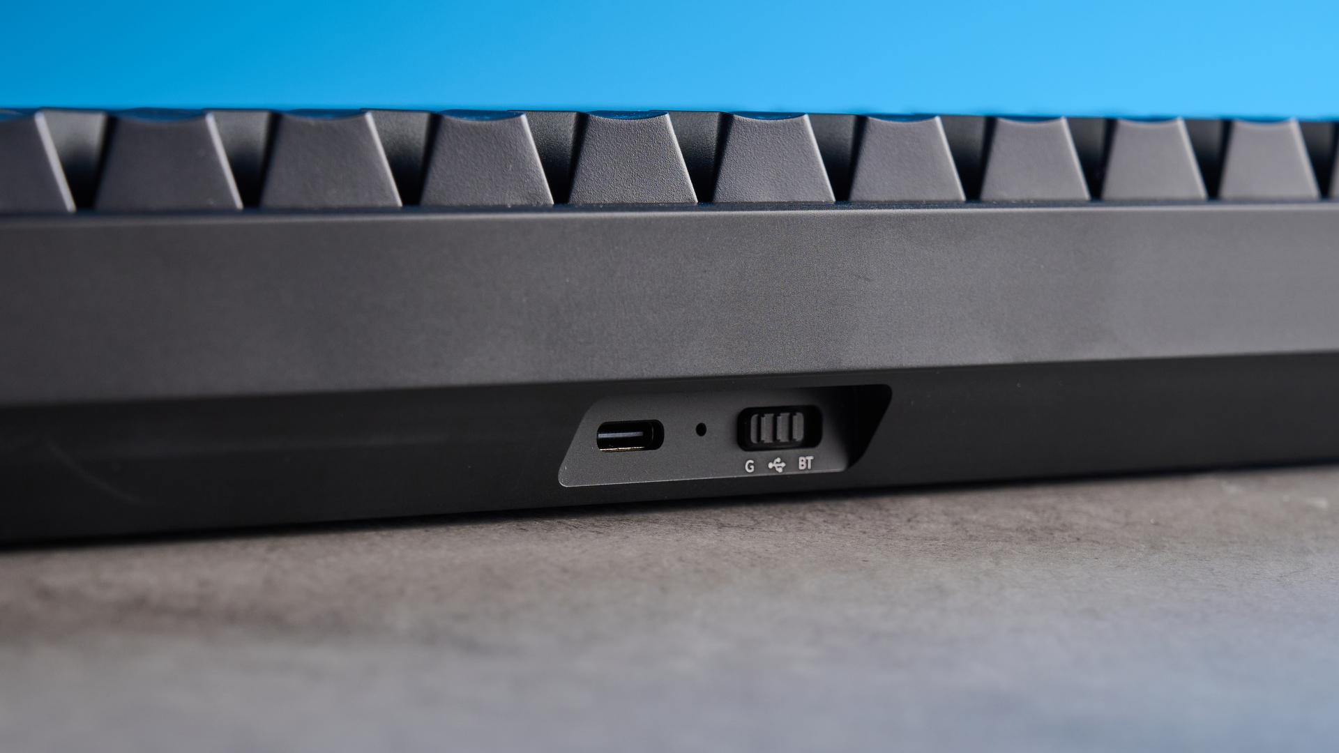 Lemokey P2 HE on a stone surface with a blue background