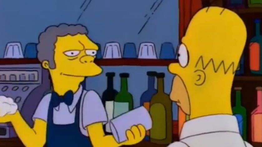 Moe looking at Homer from behind his bar. 