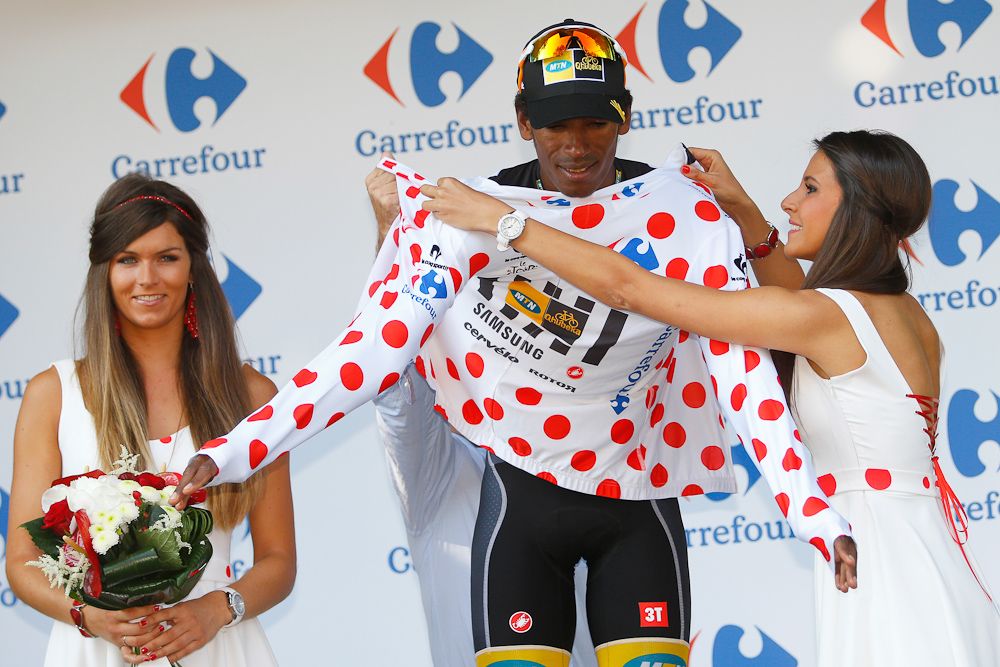 Daniel Teklehaimanot (MTN-Qhubeka) puts on the polka dot jersey at the Tour de France.