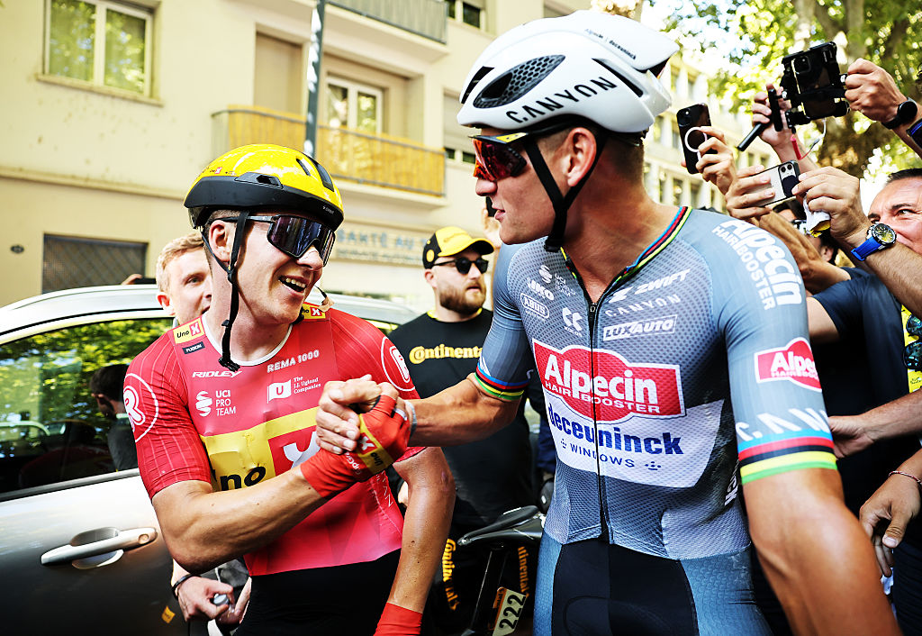 TOULOUSE, FRANCE - JULY 16: (L-R) Stage winner Jonas Abrahamsen of Norway and Team Uno-X Mobility and Mathieu van der Poel of Netherlands and Team Alpecin - Deceuninck react after the 112th Tour de France 2025, Stage 11 a 156.8km stage from Toulouse to Toulouse / #UCIWT / on July 16, 2025 in Toulouse, France. (Photo by Christophe Petit Tesson - Pool/Getty Images)