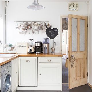 kitchen with door and pendant