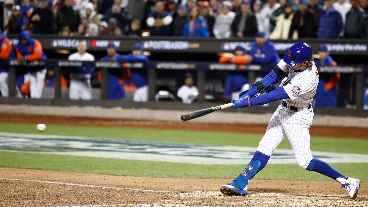 Jeff McNeil #1 of the New York Mets hits a two run double during the seventh inning against the San Diego Padres in game two of the Wild Card Series at Citi Field on October 08, 2022 in New York City.